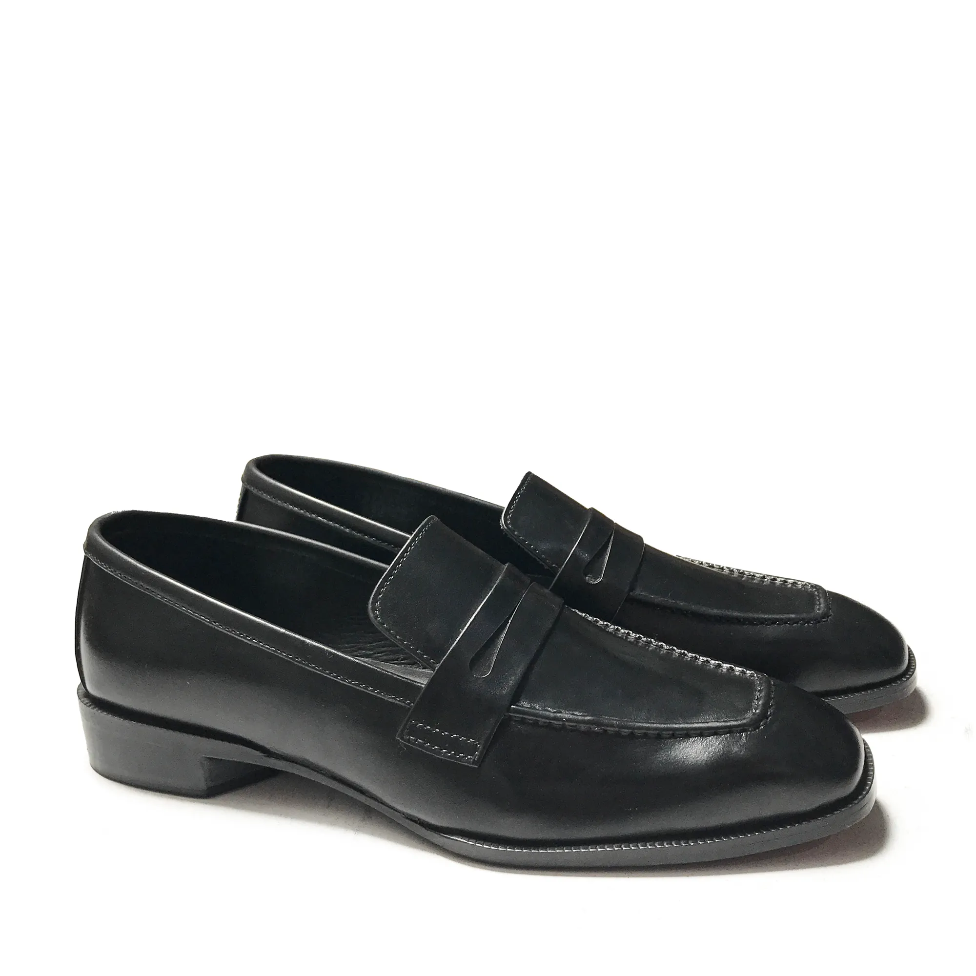 BASIC BLACK SLIP-ONS